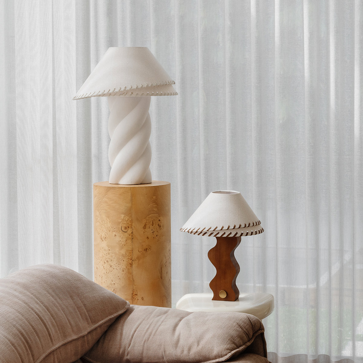 Zandro and Amalie Table Lamps shown together in a styled scene by Paola And Joy