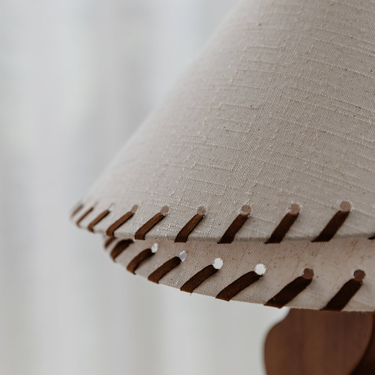 Zandro Table Lamp Large – side profile of the wooden base and linen shade by Paola And Joy
