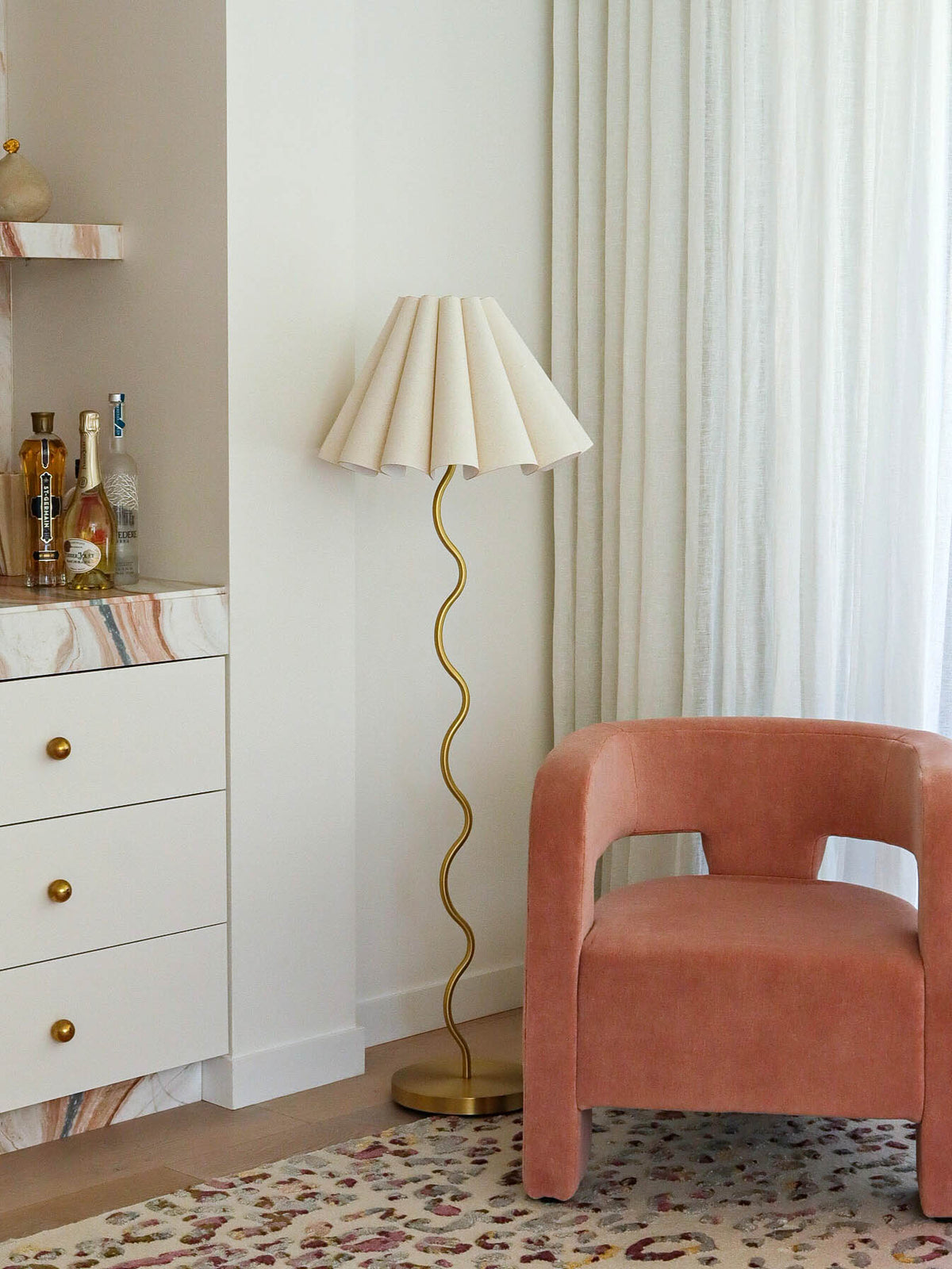 Cora Floor Lamp – full-height view of the cream linen fluted shade on brass stem by Paola And Joy