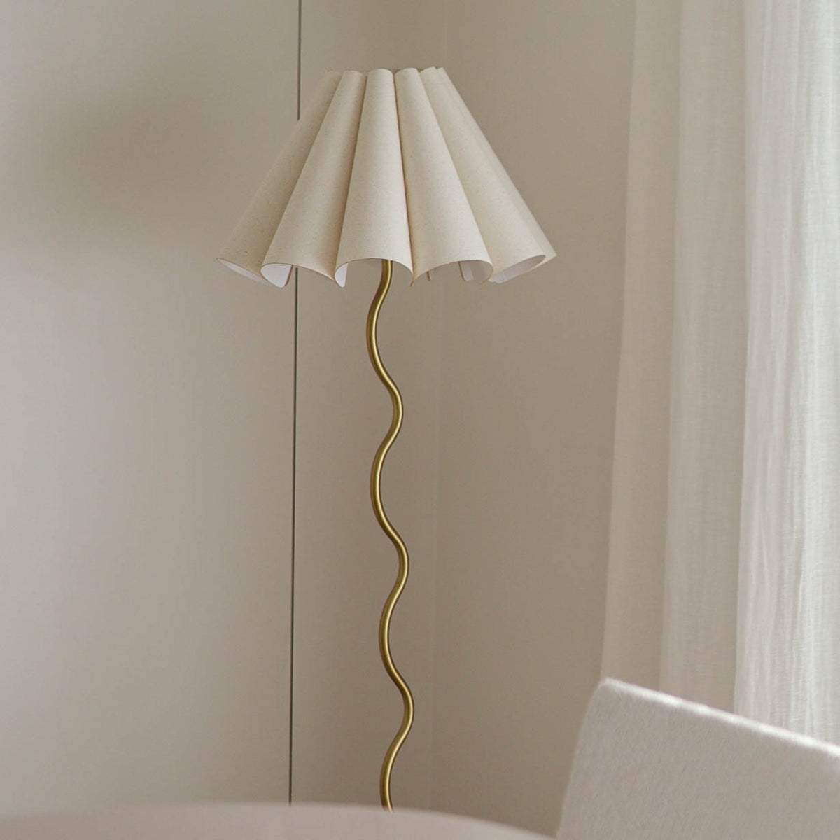 Cora Floor Lamp – side profile of the squiggly brass stem by Paola And Joy