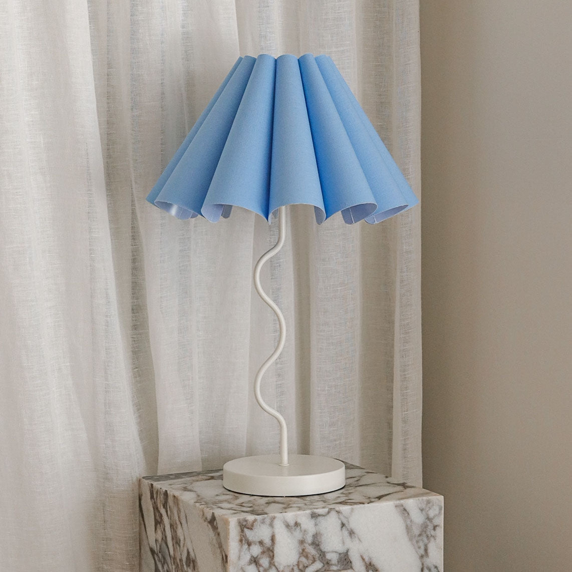 Table lamp deals with blue shade