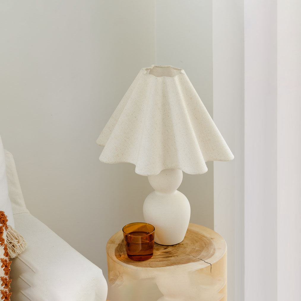 Mila Table Lamp – three-quarter angle of the cream sculptural base and linen shade by Paola And Joy